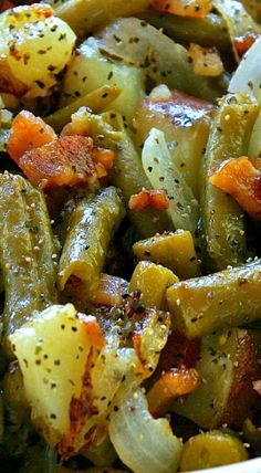 green beans and potatoes with bacon in a bowl