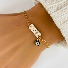 Personalised Angel Number Bracelet, Evil Eye Jewelry, Protection Bracelet, Lucky Date, Special Number, 111, 222, 444, 555, 777, 888, 999 ❤ Available in silver and gold. ❤ Specification . All component is 925 Sterling Silver or 14K Gold Filled . Bar size is 6 x 16mm . Cubic Zirconia Evil Eye charm with size 6mm . Length includes bar, jump ring and clasp . Comes in our signature pouch ready for gift giving ❤ More collections from StampedEve: https://www.etsy.com/au/shop/StampedEve?ref=hdr_shop_men 444 Bracelet, Number Jewelry, Bracelet Evil Eye, Protection Bracelet, Hand Stamped Jewelry, Angel Number, Evil Eye Charm, Stamped Jewelry, Evil Eye Jewelry