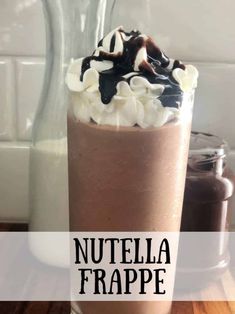 nutella frappe in a glass with whipped cream and chocolate toppings on top