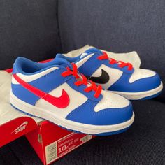 New In Box Nike Dunk Low Crimson Bright Royal In Size 10c. Casual Blue Non-slip Basketball Shoes, Blue Sporty Sneakers For Playtime, Sporty Blue Sneakers For Playtime, Nike Blue Non-slip Sneakers, Nike Non-slip Blue Sneakers, Casual Blue Sneakers For Playtime, Casual Nike Sneakers For Playtime, Blue Sporty Skate Shoes For School, Red Basketball Shoes