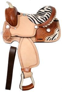 a horse saddle with zebra print on it