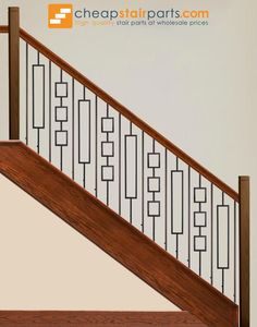 an image of a stair case with wood handrails