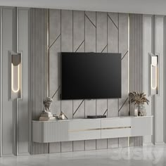 an entertainment center with a flat screen tv mounted on it's side, surrounded by decorative wall panels