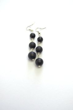 Simple and Elegant black Onyx drop earrings Elegant earrings made of high quality natural matt black onyx - simple and beautiful.This earrings is a good accessory for work or everyday use. Dress these up or down; a great basic.Most of my jewelry can easily be resized at no additional charge. I would love to assist you with your custom order, so please do not hesitate to contact with me.All my earrings is made with care and handmade.Earrings details:Length: Long dangle earrings measure 55 mm from Elegant Adjustable Matte Black Jewelry, Elegant Matte Black Adjustable Jewelry, Minimalist Handmade Black Earrings, Black Hypoallergenic Jewelry For Party, Minimalist Black Evening Jewelry, Minimalist Black Linear Drop Earrings, Minimalist Black Drop Earrings, Black Minimalist Ear Wire Earrings, Minimalist Black Earrings With Ear Wire