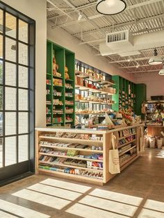 the inside of a store with lots of shelves