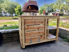 an outdoor wood fired pizza oven on wheels