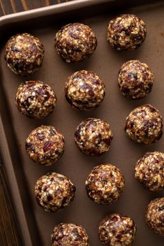 a baking tray filled with cookies and muffins