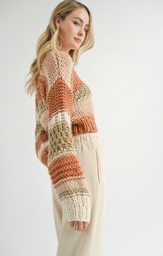 Stay chic and cozy this season with our Butter Pecan Chunky Sweater. This luxe, chunky knit sweater features beautiful detailing and is the perfect color for fall. With a cropped length, it accentuates your curves in all the right ways. Whether paired with denim and boots or dressed up with trousers or a maxi skirt, this sweater is the perfect addition to your fall wardrobe! Relaxed fit Cropped length to sit at your pant waist, highlighting your curves in all the right ways Thick luxe chunky kni Formal Dress Shops, Butter Pecan, Chunky Knits Sweater, Chunky Sweater, New Tops, Knitting Designs, Chunky Knit, High Waisted Pants, Outerwear Jackets