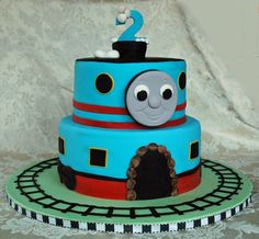 a thomas the train birthday cake on a table