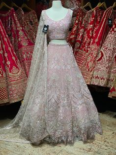 Bubblegum pink intricate with fully sequence, studs motifs thread embroidery and crystal stone flared lehenga embellished with pearl design.Styled with a matching blouse and net dupatta. Bubblegum pink gorgeousness is undoubtedly enchanting ensemble to style your wedding look. Fabric: Net Custom designed according to client measurements and color preference. Production and delivery time is 120 days! Bollywood Style Unstitched Hand Embellished Lehenga, Pink Hand Embellished Anarkali Traditional Wear, Hand Embellished Pink Anarkali Traditional Wear, Designer Lehenga With Pearl Embroidery For Diwali, Designer Pearl Embroidered Lehenga For Diwali, Pink Kundan Dupatta With Intricate Embroidery, Elegant Hand Embellished Pink Traditional Wear, Elegant Pink Hand Embellished Traditional Wear, Bollywood Lehenga With Pearl Embroidery For Reception