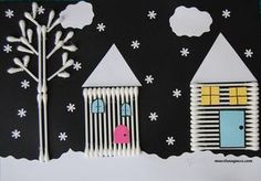 two paper houses are in the snow with trees and hearts on their windowsills