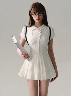 Vintage Scholar Pleated Mini Dress Elegant White Mini Dress With Doll Collar, Chic Fitted Mini Dress With Doll Collar, Summer Mini Dress For The Office, Summer Mini Dress For Office, Elegant Fitted Mini Dress With Doll Collar, White Mini Dress For Office, Preppy Fitted Knee-length Dresses, Feminine White Pleated Mini Dress, Elegant Mini Dress With Doll Collar For Spring