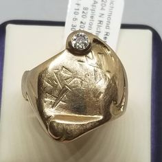 Vintage 10K Yellow Gold Diamond Signet Ring, Size 8.5 with an Est. .15 Stone. Looks like it was soldered at one time. Not marked but tested positive as 10K. Stone is 3mm. Weighs 5.2 dwt. We do not check prongs for wear or stones for looseness. All items are sold as is-noting that we are a resale shop so everything here had a previous owner! We will include flaws in the description when noted. This is one of the reasons our items are more affordable than new at a jewelry store. Are these stones r Vintage 14k Gold Signet Ring With Center Stone, Luxury Antique Yellow Gold Signet Ring, Antique 14k Gold Diamond Cut Signet Ring, Vintage Yellow Gold Signet Ring With Hallmarks, Vintage 14k Gold Diamond-cut Signet Ring, Diamond Signet Ring, Resale Shops, Star Sapphire, Signet Ring