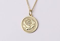 "14k Gold Tiny Rose Necklace, Personalized Rose Name Necklace, Dainty Rose Jewelry, Custom Floral Necklace, Flower Necklace Engraved, Gift for Her, Necklace for Woman, Necklace for Man, Gold Gift Necklace, Custom Engraved Charm * Material: Pendant and chain are 14k Yellow Solid Gold or 925 Sterling Silver * Pendant thickness: 0.70 mm * Inner diameter of jump ring: 4 mm * Pendant diameter: 0.55 inch (14 mm) 0.60 inch (15.30 mm) 0.65 inch (16.50 mm) 0.70 inch (17.78 mm) 0.75 inch (19.10 mm) * Chai Gold Necklaces With Roses For Anniversary, Formal Rose Gold Necklace With Rose Design, Formal Rose Design Rose Gold Necklace, Gold Necklaces With Roses For Wedding, Gold Wedding Necklaces With Rose Details, Wedding Necklace With Round Pendant And Rose Design, Wedding Necklace With Round Rose Pendant, Rose Colored Jewelry With Round Rose Design Pendant, Rose Color Jewelry With Round Rose Design Pendant