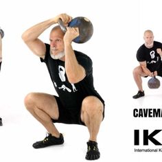 an older man squats while holding a medicine ball in one hand and lifting another with the other