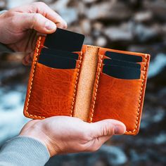 A durable bifold designed for front-pocket carry.The Vertical Wallet combines the classic bifold shape with a modern vertical style, making it perfect for front-pocket carry. Built to last a lifetime, the rustic full-grain leather not only endures the wear and tear of daily use but actually improves with age. Whether you're enjoying a night out at a craft brewery or tackling weekend projects, this wallet fits seamlessly into your lifestyle. Accidental drops, steps, or even being run over won't d Moleskine Cover, Full Grain Leather Wallet, Fisher Space Pen, Notebook Refill, Space Pen, Leather Mouse, Leather Mouse Pad, Oxblood Leather, Wallet Minimalist