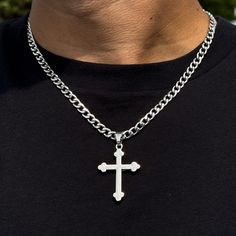 This elegant medium solid crucifix pendant is a timeless and versatile accessory that can be worn for any occasion. It is made of silver-plated alloy and comes with a 5mm Cuban chain or 4mm Rope chain. The pendant is approximately 1.5 inches wide and 2 inches long. Features: Chain Length - Cuban Chain- 22 inches - Rope Chaim- 20 inches - Material: Silver plated alloy - Dimensions: Approx. 1.5 inches width and 2 inches length - Includes: 5mm Cuban chain or 4mm Rope chain - A thoughtful gift for a Silver Metal Crucifix Necklace, Silver Cross Pendant Necklace With Chain, Silver Pendant Cross Necklace With Chain, Silver Cross Necklace With Curb Chain For Gift, Silver Stainless Steel Cross Necklace, Silver Cross Necklace With Curb Chain, Silver Figaro Chain Necklace With Cross Pendant, Silver Metal Crucifix Jewelry, Silver Crucifix Stainless Steel Jewelry