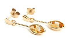 Classic style drop earrings featuring hand set, 8x4mm marquise cut Citrine gemstones suspended on rope effect posts. 22mm drop. Standard posts and butterfly backs in solid 9ct gold. Supplied in a luxury gift box. All of our Citrine jewellery can be found here; https://www.etsy.com/uk/shop/PeninsulaJewellery/search?search_query=Citrine+jewellery Citrine Drop Earrings, Gift Box Birthday, Emerald Earrings Studs, Citrine Jewelry, Uk Gifts, Citrine Gemstone, Luxury Gift Box, Dangly Earrings, Fine Jewellery Earrings