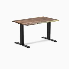 a wooden table with black metal legs