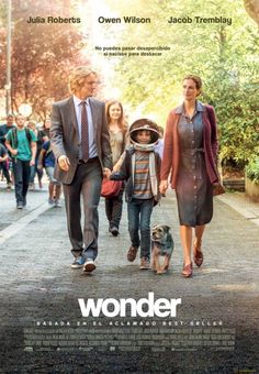 a movie poster with people walking down the street and a dog sitting on the sidewalk