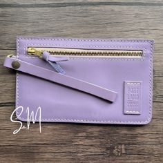 New Portland Leather Goods Lavender Adriana Pouch New And Unused From Their Mystery Box Color: Lavender - Smooth Purple Gorgeous Slim Little Pouch With Removable Wrist Strap! Approximate Dimensions: Width: 8.5" Height: 5.25" Zipper Length: 7" Wristlet : 7" Plg's Are Not Delivered With Tags Please Look Closely At Photos For Additional Details About Its Unique Character And Markings! These Are Photos Of The Exact Adriana You Will Receive! Check Out My Shop For My Latest Handmade Leather Charms Usi Purple Pouch Wallet For Travel, Leather Charms, Purple Leather Wallets For Gifts, Purple Rectangular Pouch With Zipper Closure, Purple Leather Wallet, Elegant Purple Leather Wallets, Portland Leather Goods, Mystery Box, Box Color