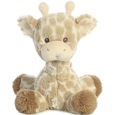 a giraffe stuffed animal sitting on the ground