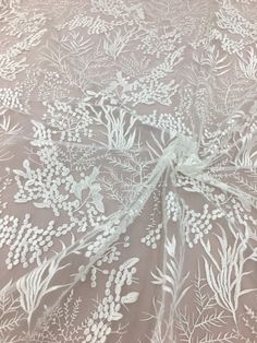 Welcome to my shop This stunning Lace Fabric design piece has soft hand feel, Perfect for wedding dress, evening dress, bridal wear, wedding gown, bodice or curtains, etc. This listing is for 1 yard, If you buy more, you will get an uncut piece. About Size : Lenght: 91cm (35.8inches); Wide: 130cm (51inches). Colors: Off-white Material: Polyester We offer special discounts for designers and wholesale orders! About Shipping: We transport free of charge through China Post. The United States usually White Embroidered Fabric For Ceremony, Ceremony Cream Embroidered Fabric, White Intricate Embroidered Fabric For Ceremony, White Embroidered Fabric For Ceremonies, Cream Embroidered Fabric For Ceremony, White Embroidered Lace Fabric For Ceremony, Ceremonial White Embroidered Fabric With Lace Work, White Tulle Fabric With Intricate Embroidery For Ceremony, Wedding Lace Fabric With Intricate Embroidery