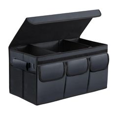 an open black storage box with four compartments