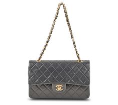 Indulge in the timeless elegance of the pre-owned Chanel Classic Double Flap shoulder bag, crafted from luxurious lambskin in a sophisticated black, complemented by striking goldtone hardware. This exquisite piece features a double strap and an organized interior with two slip pockets, ensuring your essentials are neatly stored. From Chanel. Pre-owned Classic Business Shoulder Bag, Classic Pre-owned Business Shoulder Bag, Pre-owned Business Bags, Adaptive Clothing, Koolaburra By Ugg, Beauty Storage, Flap Shoulder Bag, American Leather, Designer Handbag