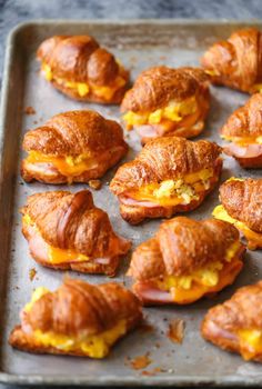 breakfast croissants on a baking sheet ready to be eaten