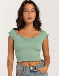 Bdg Urban Outfitters Elise Cap Sleeve Knit Top. Rib Knit Construction. Cinched Detailing At Center Chest. V-Neckline. Cap Short Sleeves. Lettuce Edge Trim. Fitted Silhouette. Cropped Length. 94% Polyamide, 6% Elastane. Machine Wash. Imported.model Is Wearing A Size Small. Model Measurements:height: 5'7" Bust: 34"waist: 25"hips: 34.5" Cheap Urban Outfitters Cotton Crop Top, Trendy Knit V-neck Crop Top, Casual Stretch V-neck Crop Top, Casual V-neck Stretch Crop Top, Green Ribbed V-neck Crop Top, Trendy V-neck Knit Crop Top, Casual Knit Cropped Top, Casual Ribbed Knit Crop Top, Casual Seamless Knit Tops