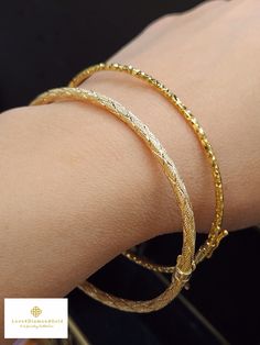 Gift yourself or your love once this Elegant Sleek Shiny Bangle. Crafted with 18 Karat Gold. Great for stacking. *Karat: 18 Karat *Weight: Approx. 2.92g *Size: Approx.  2.49 Inches x 2.12 Inches *Width: Approx. 2mm *REAL 18 Karat Gold. NOT Gold filled nor Gold Plated. Hallmarked Bangle is lightweight. This is a real gold bangle. Any harsh impact may deformed your bangle.  Handle with Care 💥PLS FOLLOW US AND CHECK OUR OTHER LISTINGS. WE HAVE NEW STOCKS LISTED DAILY/WEEKLY.  📬S H I P P I N G WE Bangle Diamond, Minimalist Bracelet, Gold Bangle, Gold Bangles, Gold Style, Diamond Cut, Real Gold, Gold Filled, Diamond Cuts