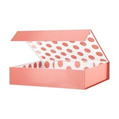 an open pink box with polka dots on it