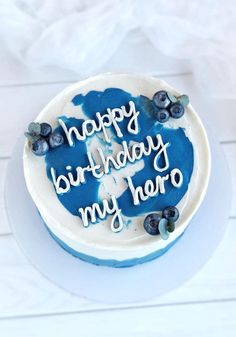 a blue and white birthday cake with the words happy birthday to my son on it