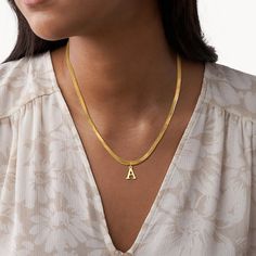 Introducing our Initial Snake/Herringbone chain – a timeless blend of elegance and personalization. Crafted with precision, this delicate herringbone chain features a customizable initial pendant, making it a perfect expression of your unique style. Whether a thoughtful gift or a chic addition to your own collection, this necklace effortlessly combines classic design with a touch of individuality. Elevate your look with the Initial Snake Chain, where sophistication meets personal flair. Choose y Classic Initial Pendant Necklace With Box Chain, Elegant Tarnish-resistant Initial Pendant Chain Necklace, Elegant Tarnish Resistant Initial Pendant Chain Necklace, Modern Initial Pendant Necklace With Delicate Chain, Delicate Chain Herringbone Necklace As Gift, Chic Personalized Initial Pendant Necklace, Trendy Herringbone Necklace With Delicate Chain For Gift, Tarnish Resistant Herringbone Necklace Gift, Modern Initial Necklace For Anniversary