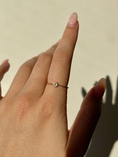 🖊️ Product details 🖊️ Gold waterproof ring, stainless steel material with clear CZ round stone on twisted band. AAA Grade CZ.  Weight 0.41g. Sizing: Size 7 ~ 17.3mm Check out our other waterproof jewellery here: https://www.etsy.com/au/shop/CatAndMogi?ref=seller-platform-mcnav§ion_id=40329032 💌 Care 💌 Our gold rings are waterproof and won't tarnish! They will not rust or turn your fingers green when in contact with water or sweat, hooray! 💛 Thank you for choosing our store, we hope you love your goodies as much as we do!💛 Dainty Tarnish Resistant Crystal Promise Ring, Tarnish Resistant Cubic Zirconia Crystal Ring For Promise, Tarnish Resistant Cubic Zirconia Promise Ring, Tarnish Resistant Cubic Zirconia Crystal Promise Ring, Minimalist Cubic Zirconia Crystal Ring, Everyday Cubic Zirconia Rings With Bezel Setting, Everyday Diamond Ring With Vs Clarity, Adjustable Diamond Ring For Everyday, Minimalist Cubic Zirconia Crystal Ring Gift