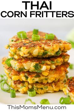 three corn fritters stacked on top of each other with the words thai corn fritters above them