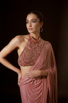 Scarab serenity peach stitched sari and blouse – INDIASPOPUP.COM Glamorous Sleeveless Embellished Pre-draped Saree, Pink Embellished Blouse With Traditional Drape, Pink Embellished Blouse Piece For Evening, Elegant Pink Blouse Piece For Evening, Glamorous Pink Pre-draped Saree With Mirror Work, Pink Sequined Choli For Evening, Pink Sequined Evening Choli, Pink Blouse Piece With Sequins For Evening, Pink Evening Blouse Piece With Sequins