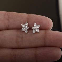 Genuine Pear Cut Diamond Cluster Stud Earrings, Solid 14K White Gold Earrings, Certified Diamond Jewelry, Bridesmaid Jewelry NY Minimalist - SOLD AS A PAIR * SKU: SGE01643-47570 * Made to Order. * Gold Purity: 18K Solid Gold (stamped) * Custom Gold Color: Rose Gold, Yellow Gold, White Gold * Custom Gold Purity: 10K/14K/18K (Charges Apply) * Diamond 100% Genuine Diamond * Diamond Weight: 0.80 ct. * Diamond Color: G-H * Diamond Clarity: SI1- SI2 * Diamond Cut: Pear Cut ✦ Product Measurement * Studs Size: 10.5 x 8 mm ✦Size can be customized to your request, please mention the required size in buyer notes (Charges may apply) ✦ Shipping We are located in the USA NY, We ship worldwide by USPS, UPS, and FedEx. Since most items are 'made to order', please note that it may take 1 - 2 weeks to be re Dainty Marquise Wedding Earrings, Dainty Cluster Earrings For Anniversary, Dainty White Gold Cluster Earrings For Anniversary, Dainty Wedding Cluster Earrings With Prong Setting, Wedding Diamond Cut Cluster Earrings, Wedding Cluster Earrings With Diamond Cut, Gift Sterling Silver Marquise Cut Earrings, Marquise Cut Sterling Silver Diamond Earrings As Gift, Delicate Sterling Silver Cluster Earrings For Anniversary