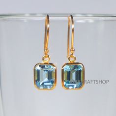 "Natural Sky Blue ue Topaz Earring, 925 Sterling Silver Gold Plated Earring Octagon Earrings, Women Gift Earring, Topaz Earring, Blue Colour Earring  Gemstone Name :  Sky Blue Topa Gemstone Shape : Octagon Shape Gemstone Cut :Normal Cut Material : 92.5 Silver Gold Plated Earrings Gemstone Size : 10X8 MM Materials : 92.5 Sterling Silver Dangle Earring Country/Region of Manufacture : India Made In : Jaipur Rajasthan Payment Policy------------------------------ we accept payment through PayPal only, Payment should be made within 3 days of purchase. . Delivery Time------------------ Item will be Shipped Within 24 hours after payment is cleared The delivery time usually takes 12 to 21 days, depending which country & location Customers are responsible for duties and VAT charged by their country Elegant Aquamarine Nickel-free Earrings, Blue Topaz Birthstone Drop Earrings, Elegant Nickel-free Blue Topaz Jewelry, Elegant Blue Topaz Earrings With Ear Wire, Elegant Nickel-free Blue Topaz Earrings, Elegant Blue Topaz Nickel-free Earrings, Gift Blue Topaz Birthstone Earrings, Nickel Free Blue Topaz Earrings For Anniversary, Blue Topaz Drop Earrings Jewelry Gift