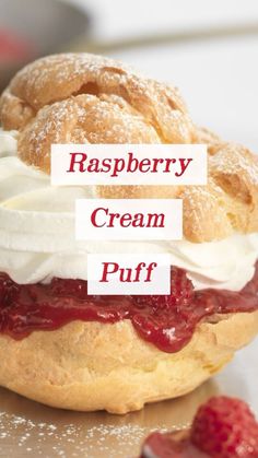 raspberry cream puff with whipped cream on top