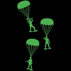 three silhouettes of people with parachutes in the air, one man holding onto another person's head