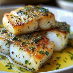 Let me introduce you to Golden Seared Cod with Herb Butter Sauce. This dish features perfectly seared cod fillets, drizzled with a rich and flavorful herb butter sauce. It's a simple yet sophisticated meal that's perfect for any occasion. The beauty of this recipe lies in its simplicity. The cod is seared to golden perfection, creating a crispy exterior while keeping the inside tender and flaky. The herb butter sauce, made with fresh herbs and garlic, adds a luxurious touch that elevates the ... Scrod Cod Recipes, Beach Cooking, Cod Recipes Healthy, Herb Butter Sauce, Seared Cod, Cod Dishes, London Broil Recipes, Best Fish Recipes