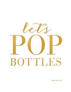 the words let's pop bottles written in gold foil on a white paper background