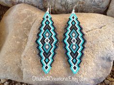 "Here's a pair of Turquoise, Black and Gunmetal Southwest Beaded Earrings are lightweight and comfortable to wear all day long. Made with high quality glass Delica Beads, beaded one bead at a time. Love and passion goes into making my jewelry. This process requires focus, patience and dedication. Each bead is 16th of an inch and can take hours to complete a project. These southwest earrings are  3.5\" long and 1 1/4\" wide including french hooks. Beautiful earrings for everyday wear. They would make a great gift or treat for yourself. Handmade is from the Heart ❤️ Handmade in Arizona 🇺🇸 Thank you for stopping by, please come again. Have a great day!" Handmade Traditional Turquoise Beaded Earrings, Southwestern Style Turquoise Beaded Earrings, Cheap Southwestern Blue Beaded Earrings, Black And Turquoise Beaded Earrings, Delica Beaded Earrings, Turquoise And Black Beaded Earrings, Southwestern Turquoise Beaded Earrings, Nickel Free, Native American Beaded Earrings, Swirl Earrings