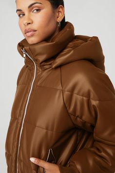 Make boss moves in the Faux Leather Boss Puffer. It’s cold-weather-approved and done in our luxe, buttery faux leather with satin lining for comfort and warmth. Zippered side pockets keep essentials secure and the classic, oversized fit makes it a must-have season after season. Luxe, buttery faux leather Satin lining Zippered side pockets & hidden internal pocket Designed & uniquely fit to flatter every size Wear-tested by our in-house team for the perfect fit Alo Yoga Nylon Outerwear For Fall, Quilted Fall Puffer Jacket For Travel, Fall Travel Quilted Puffer Jacket, Alo Yoga Fall Puffer Outerwear, Fall Travel Puffer Jacket, Fall Nylon Puffer Jacket With Faux Fur Lining, Boss Moves, Boss Brand, Cinnamon Brown