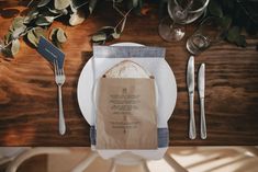 a place setting with napkins and silverware