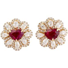 Cast from 14-karat gold, these beautiful stud earrings are hand set with 1.9 carats heart shape rubies & 1.3 carats of sparkling diamonds. FOLLOW MEGHNA JEWELS storefront to view the latest collection & exclusive pieces. Meghna Jewels is proudly rated as a Top Seller on 1stDibs with 5 star customer reviews. All items manufactured by us are handmade and can be customized or redesigned. Composition Total Weight-6.02 Gold Weight(Gms)-5.38 Diamond Wt(Cts)-1.3 Ruby Wt(Cts)-1.9 Ruby Earrings Studs, White Gold Studs, Artisan Earrings, Heart Stud Earrings, Heart Shaped Diamond, Gold Flower, Ruby Diamond, Flower Earrings Studs, Heart Studs