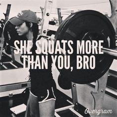 a woman lifting a barbell with the words she squats more than you, bro