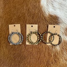 Hoop earrings by designer, Amy Kaplan. Hand made in New York. Select from pewter, gold, bronze. The perfect bohemian cowgirl jewelry for your western lifestyle.